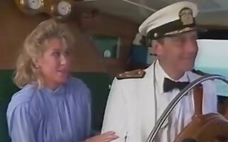 Candy Evans and John Leslie on a boat....