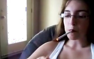 Elizabeth Douglas age 18 learning to smoke Virginia Slims